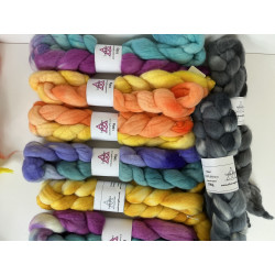 Image shows 8 braids of Merino fibre in non neon colours